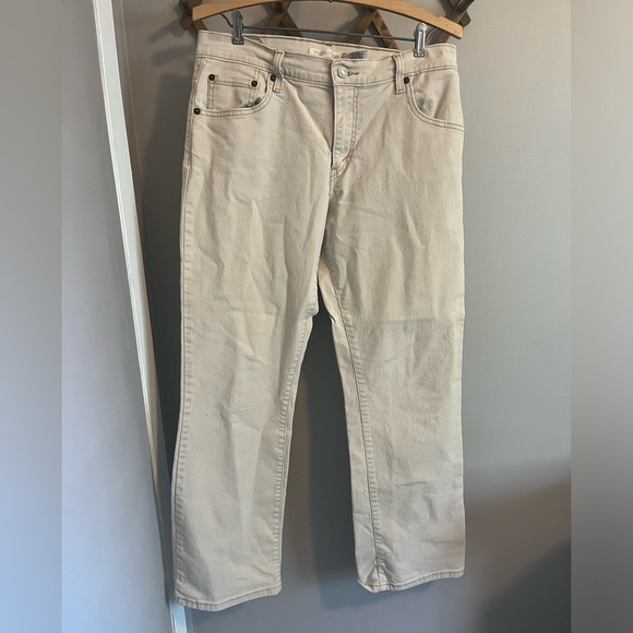 Levi's Pants - Levi’s 550 light beige relaxed fit boot cut jeans size 12 neutral
